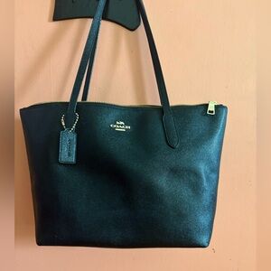 Coach Black Leather Top Zipper Tote,
Used, just polished.
